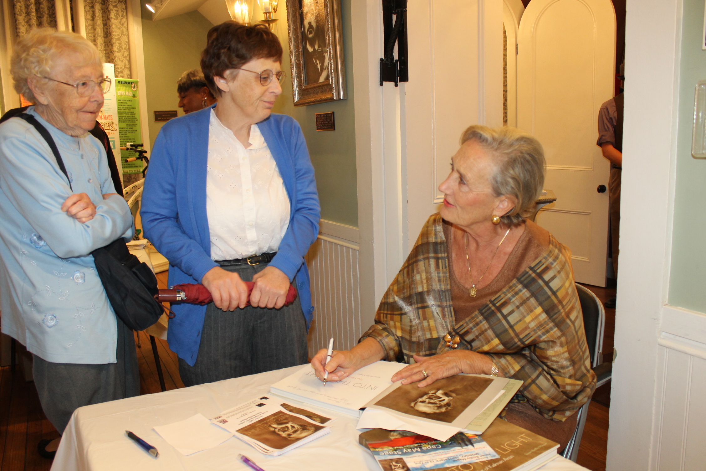 Susan Bielby Magee signing books